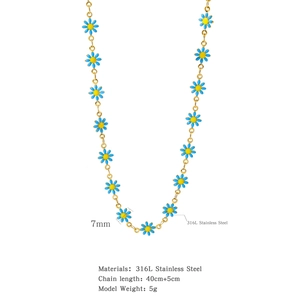 Detailed view of 7mm blue enamel daisy flower charms on a 316L stainless steel chain