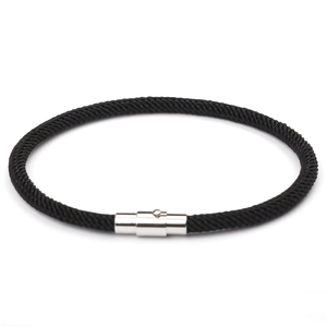Minimalist black braided lucky red string bracelet with polished silver magnetic clasp