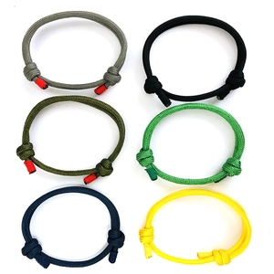 Detail view of 550 paracord bracelets in six vibrant colors with adjustable sliding knots