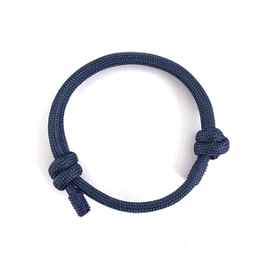Minimalist navy blue paracord bracelet with adjustable nautical anchor knots for couples
