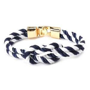 Blue and white nautical braided rope bracelet with a gold metal clasp for men and women