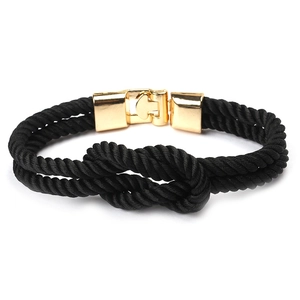 Minimalist black braided couple bracelet with knot and gold-plated metal folding clasp