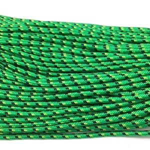 Close-up of durable 3mm paracord with green, black, and yellow woven pattern