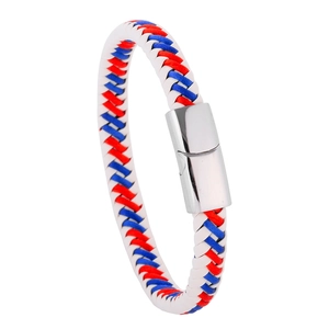 Detailed close-up of a three-color braided leather bracelet with silver magnetic metal clasp