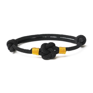 Handmade woven couple bracelet with black cord and golden thread Chinese knot design