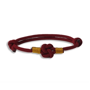 Handcrafted burgundy braided rope couple bracelet with gold silk thread knots