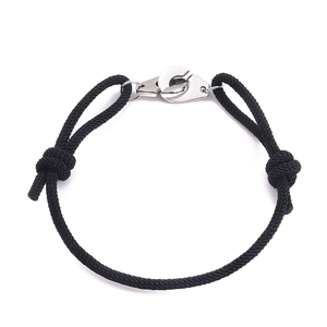 Adjustable black braided rope bracelet with silver stainless steel handcuff clasp design