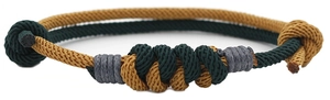 Detailed view of handmade woven concentric knot bracelet with adjustable sliding knot cord