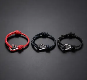 Detail of nautical braided bracelets with stainless steel horseshoe shackles and u-buckles