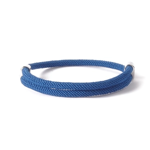 Detail of navy braided anchor bracelet with adjustable double silver metal buckles