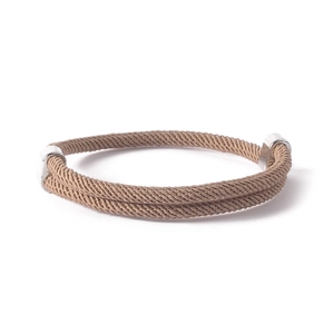 Close-up of anchor rope bracelet with silver metal buckles and double woven cord