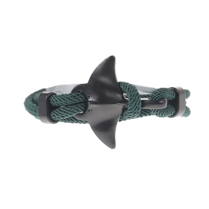 Macro shot of dark green woven nylon paracord with black matte metal fish tail clasp