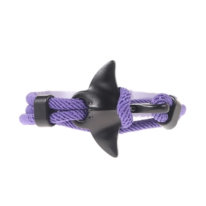 Detail of purple braided rope bracelet with matte black whale tail hook closure