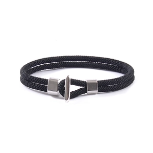 Minimalist double-layered black braided rope bracelet with a polished silver T-bar clasp