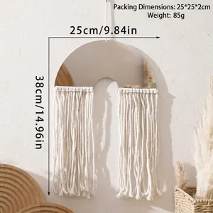 Bohemian macrame wall mirror with white fringe tassels and dimensions of 25x38cm