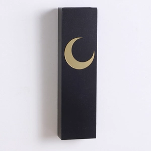 Detail of black wooden moon wall shelf showing matte finish and golden crescent moon motif