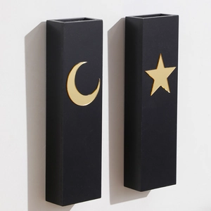 Minimalist black wooden wall-mounted vases with gold moon and star patterns for home decor