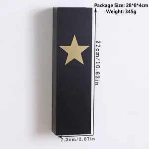 Detail view of black moon star wooden shelf with size measurements 27cm long and 7.3cm wide