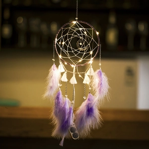 Handmade moon dream catcher with purple feathers, warm LED lights, and white tassels