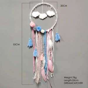 Detail showing 20cm dreamcatcher with white plush clouds and feathers hanging