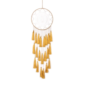 Detailed view of hand-woven bohemian dreamcatcher with layered golden yellow tassels