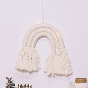 Handmade ivory cotton rainbow wall hanging with soft LED lights and tassels for home decor