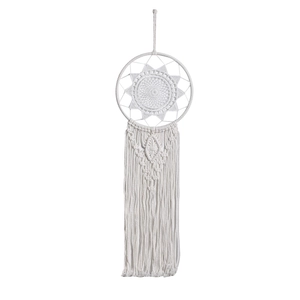 Detailed view of hand-woven bohemian dreamcatcher with white cotton ropes and tassels
