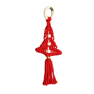 Handmade red macrame Christmas tree wall hanging with wooden beads and tassels decoration