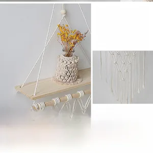 Detail of bohemian hand-woven cotton rope tapestry shelf with light wood board