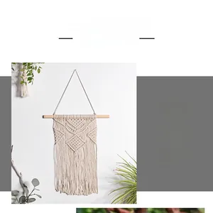 Detailed view of bohemian hand-woven cotton macrame tapestry with fringe on a wooden rod