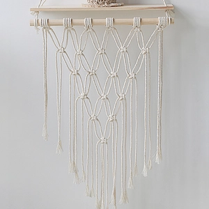 Bohemian woven cotton wall hanging with wood shelf and tassel fringe decor