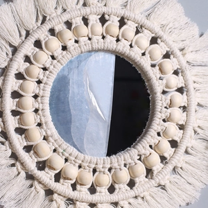 Bohemian handmade macrame wall mirror with cotton rope fringe and natural wood beads