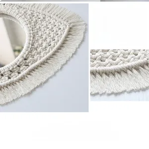 Gros plan détaillé des franges en macramé fait main et des motifs de tissage en coton blanc