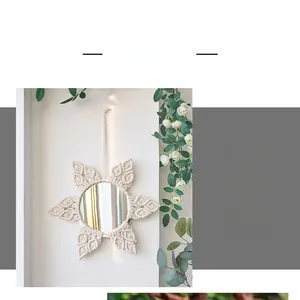 Detailed close-up of Bohemian handmade woven cotton rope flower mirror for wall decoration