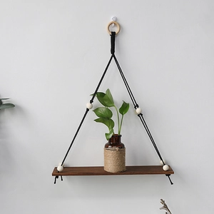 Bohemian woven tapestry wall shelf with dark wood board and decorative beads