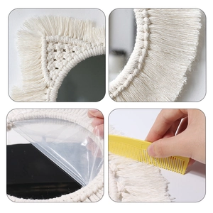 Boho macrame cat-ear mirror with handcrafted fringe and geometric woven details