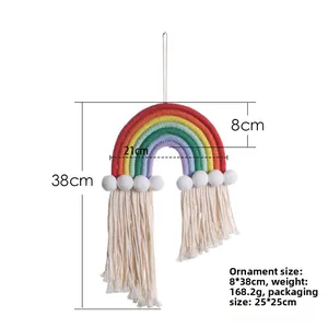 Detailed dimensions of the colorful hand-woven rainbow tapestry with white pom-poms