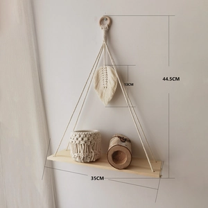 Bohemian woven macrame wall hanging shelf with leaf decor and wood base for home