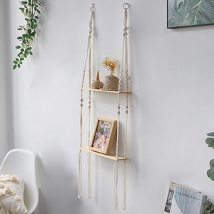 Bohemian double-tier wood floating shelf with white hand-woven cotton rope hangers