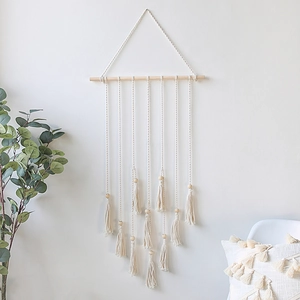 Bohemian hand-woven macrame wall hanging with wooden beads and fringes for home decor