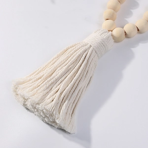 Minimalist wooden bead curtain tieback with white cotton tassel for home decoration