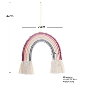 Detail showing colorful rainbow woven wall hanging with cotton tassels and dimensions