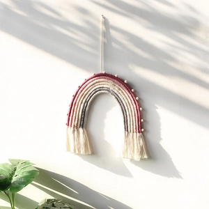 Nordic macrame rainbow wall hanging with soft tassels and white felt ball decor