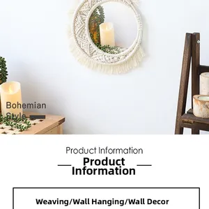 Detail of bohemian macrame mirror with handmade woven fringe and cotton rope wall decor