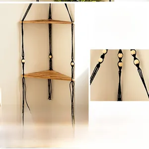 Detail of hand-woven ropes and natural wood grain on the double triangle wall shelf