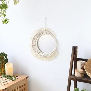 Handmade bohemian crescent macrame mirror with cotton fringe and round glass for wall decor