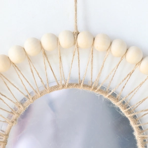Boho woven wall mirror with natural jute rope fringe and radial wooden beads decoration