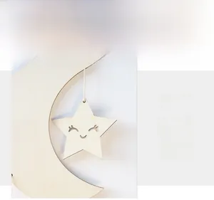Close-up of wooden moon and smiling star hanging decor for nursery wall decoration