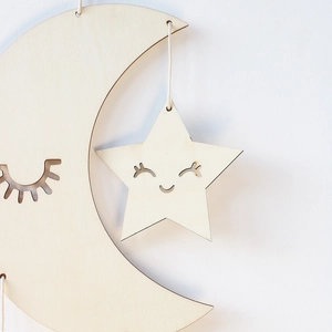 Nordic wooden wall hanging with moon and hollow star elements in natural finish