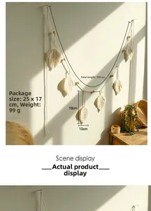 Detail of bohemian leaf wall hanging showing cotton weave texture and wooden beads